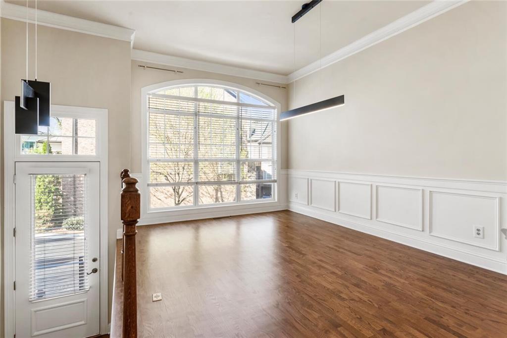 2663 Rivers Edge Drive Northeast Brookhaven, GA 30324 - Photo 4 of 37 wooden floor in an empty room with a window