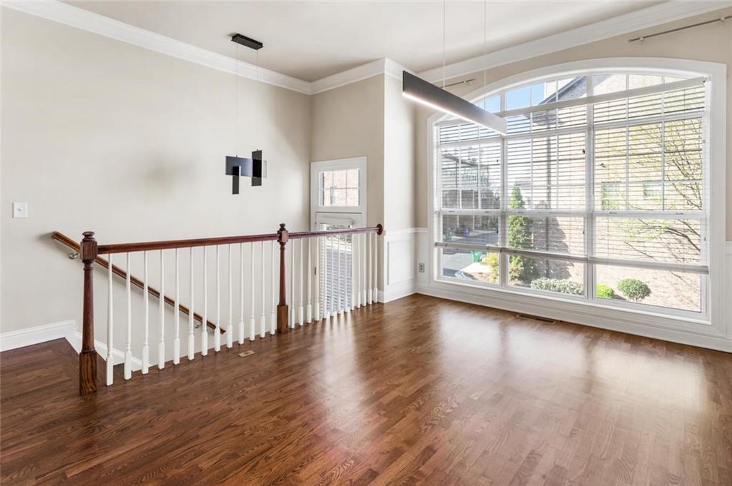 2663 Rivers Edge Drive Northeast Brookhaven, GA 30324 - Photo 5 of 37 a view of room with wooden floor and windows
