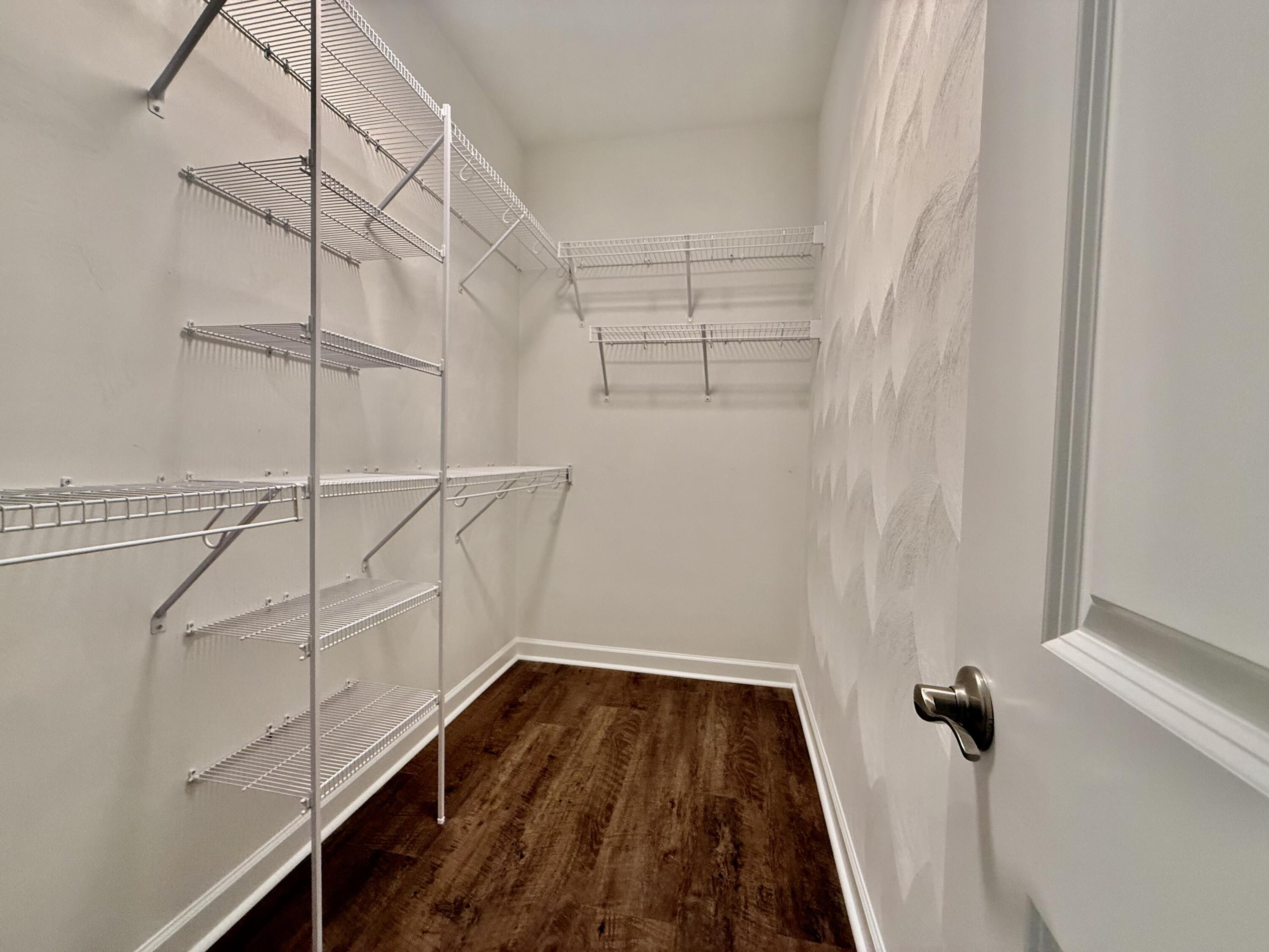 5185 Cove Road Roanoke, VA 24019 - Photo 11 of 18 a view of a room with racks on the wall