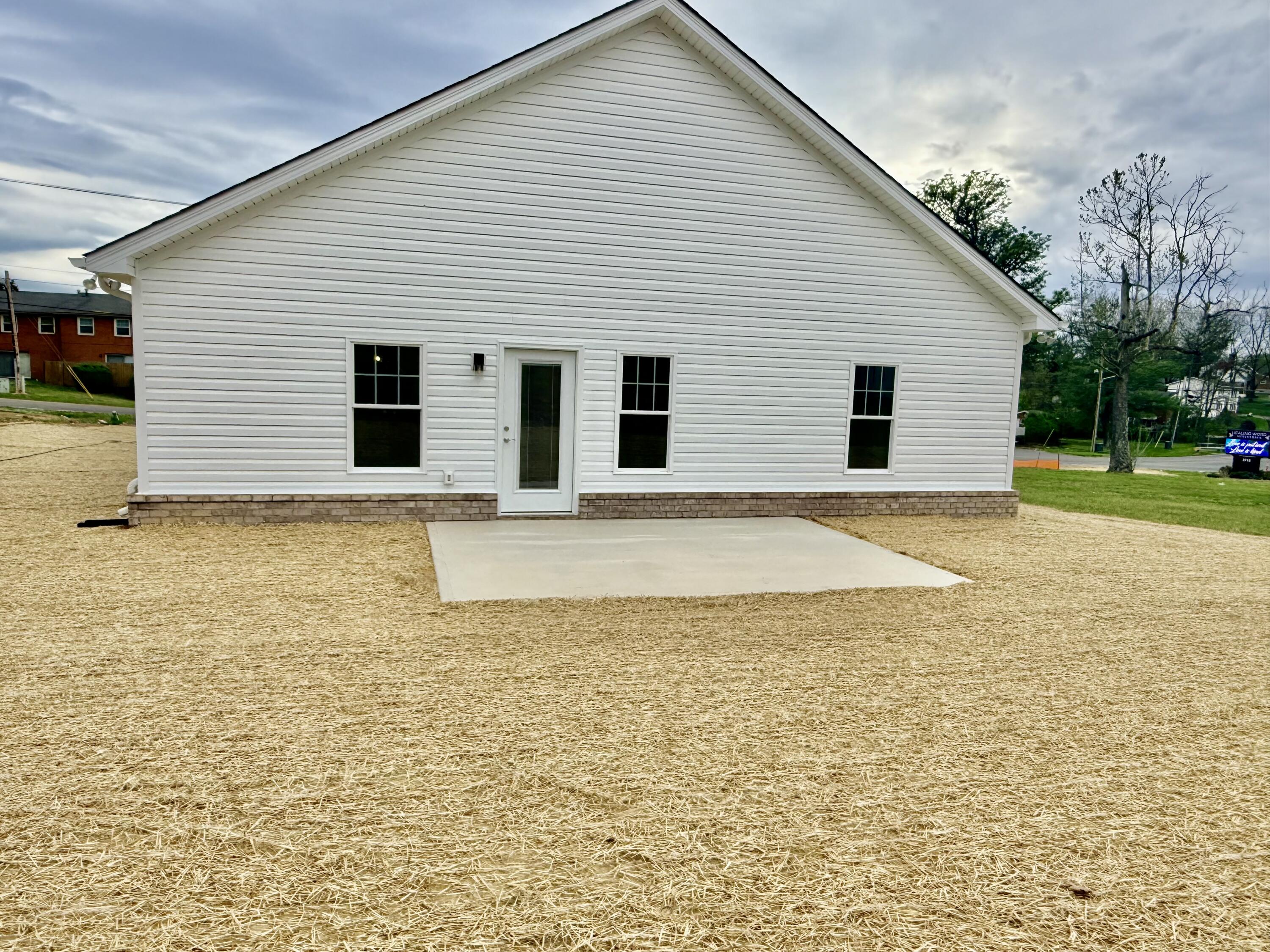 5185 Cove Road Roanoke, VA 24019 - Photo 16 of 18 a view of a house with a yard