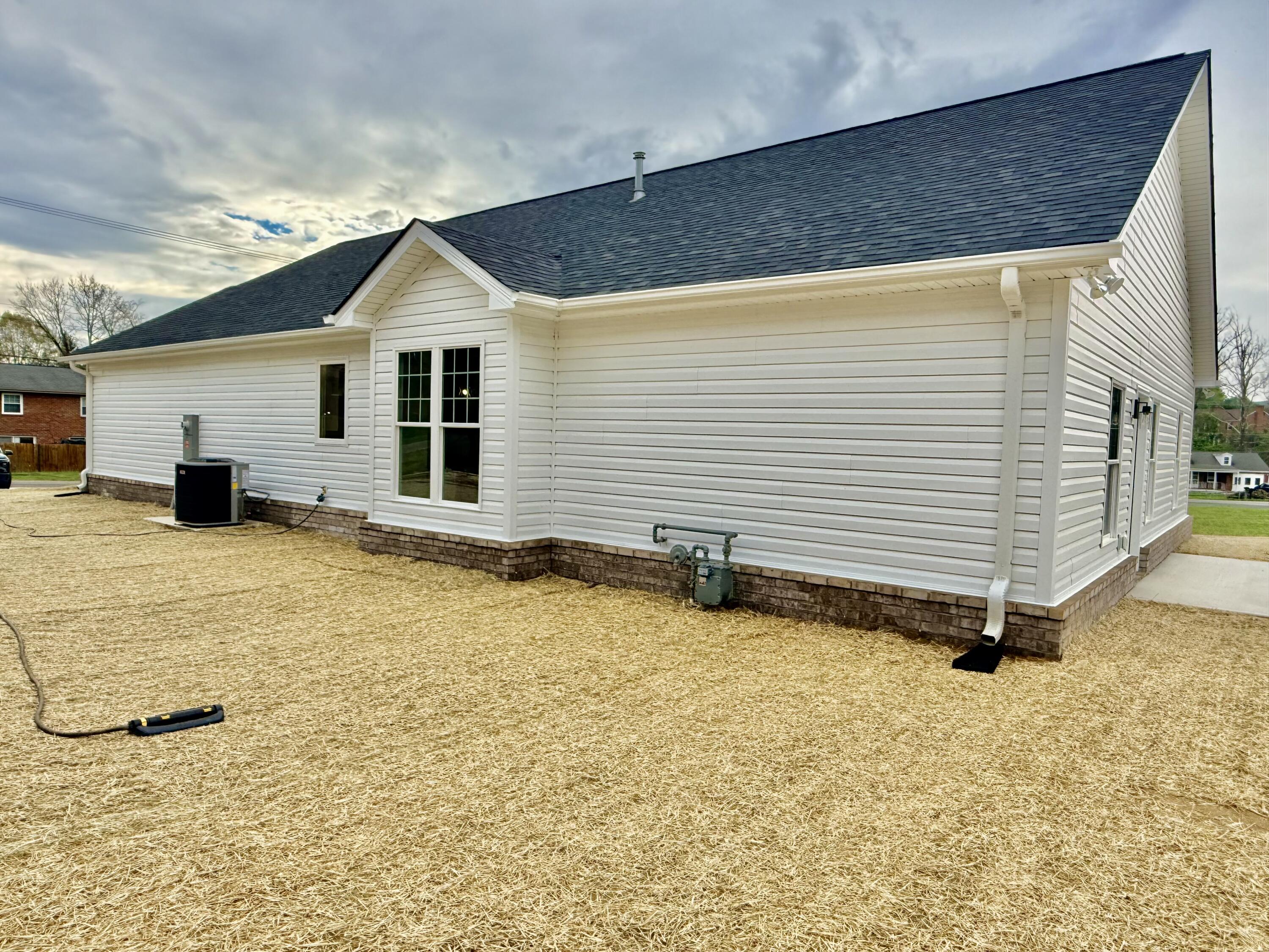 5185 Cove Road Roanoke, VA 24019 - Photo 17 of 18 a view of a house with a yard