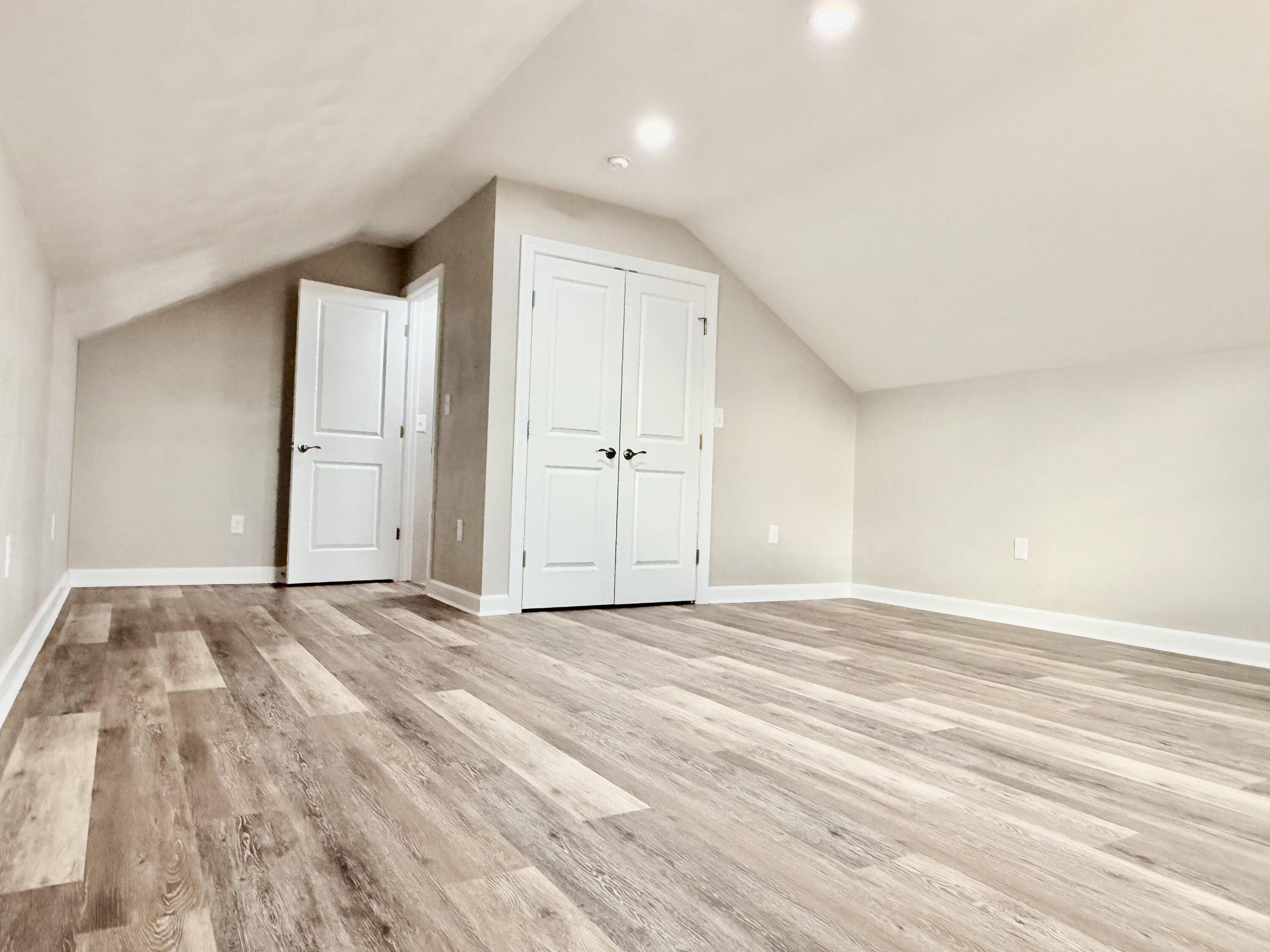 5185 Cove Road Roanoke, VA 24019 - Photo 10 of 18 a view of an empty room and wooden floor