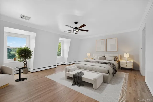 a bedroom with a bed and a couch