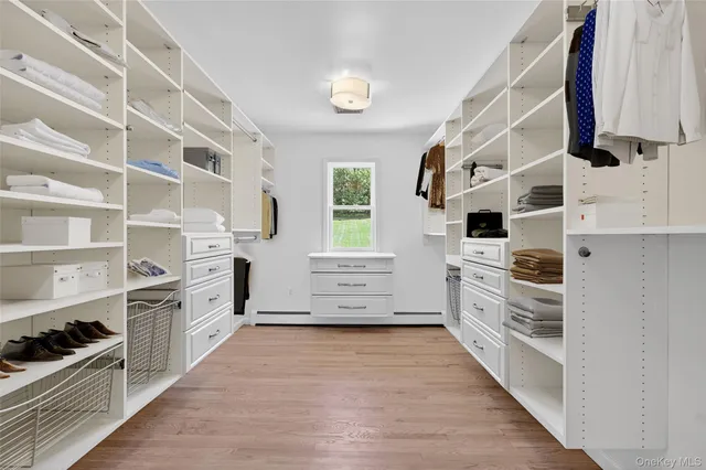 a kitchen with stainless steel appliances a stove and more cabinets