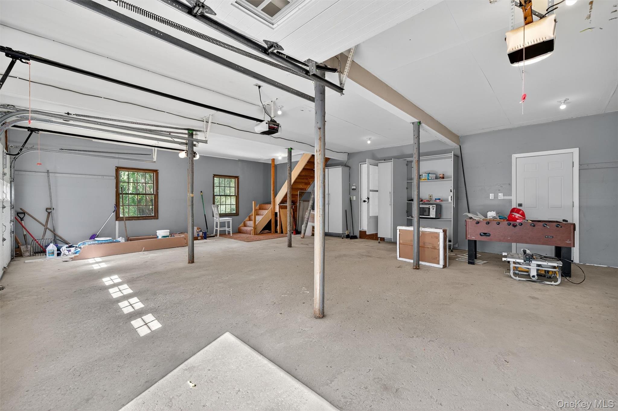 11 Deer Meadow Road Warwick, NY 10990 - Photo 26 of 42 a living room with furniture and a gym machine