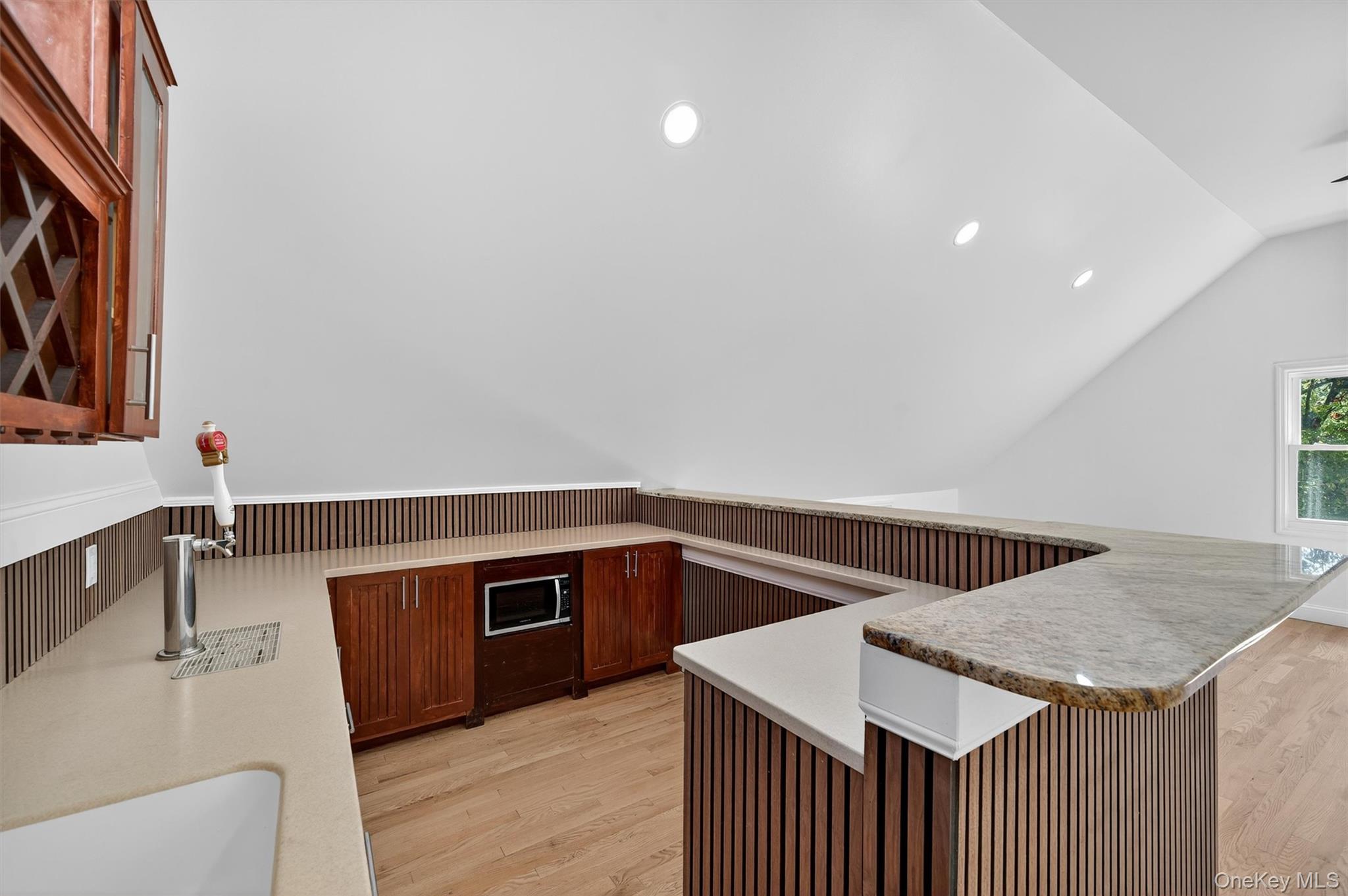 11 Deer Meadow Road Warwick, NY 10990 - Photo 32 of 42 a kitchen that has a sink and a stove in it