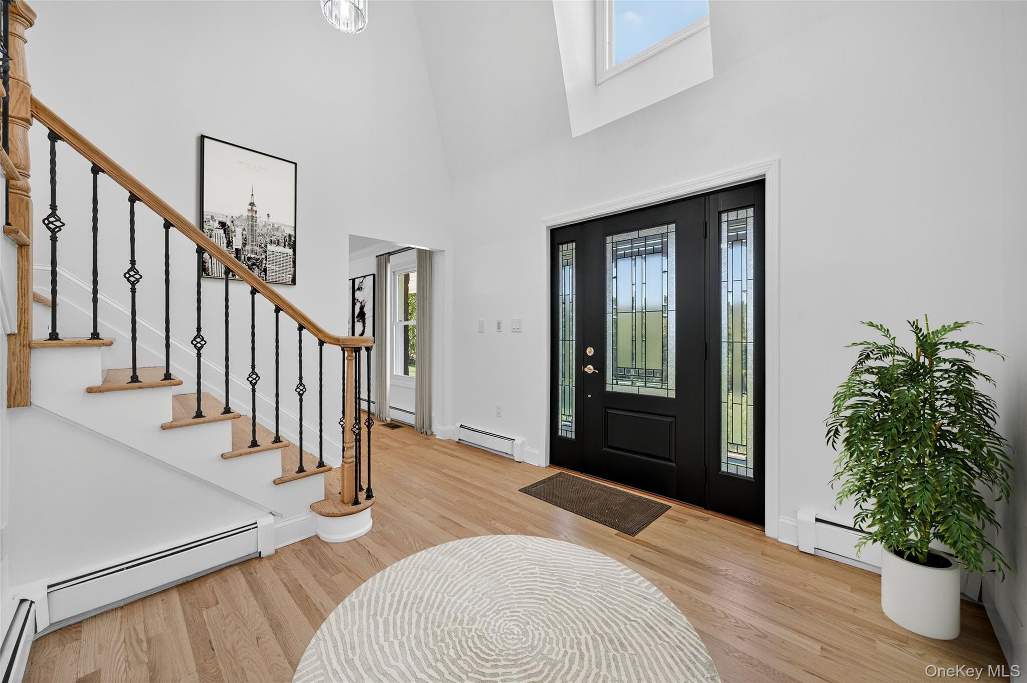 11 Deer Meadow Road Warwick, NY 10990 - Photo 4 of 42 a bedroom with a bed and a potted plant