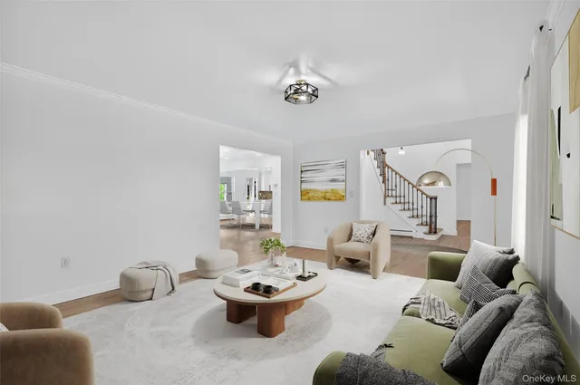 a living room with furniture and a table