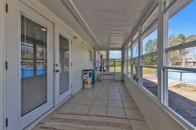 a view of a swimming pool with an ocean view