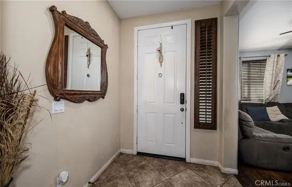 a kitchen with stainless steel appliances granite countertop a stove a sink refrigerator and a microwave