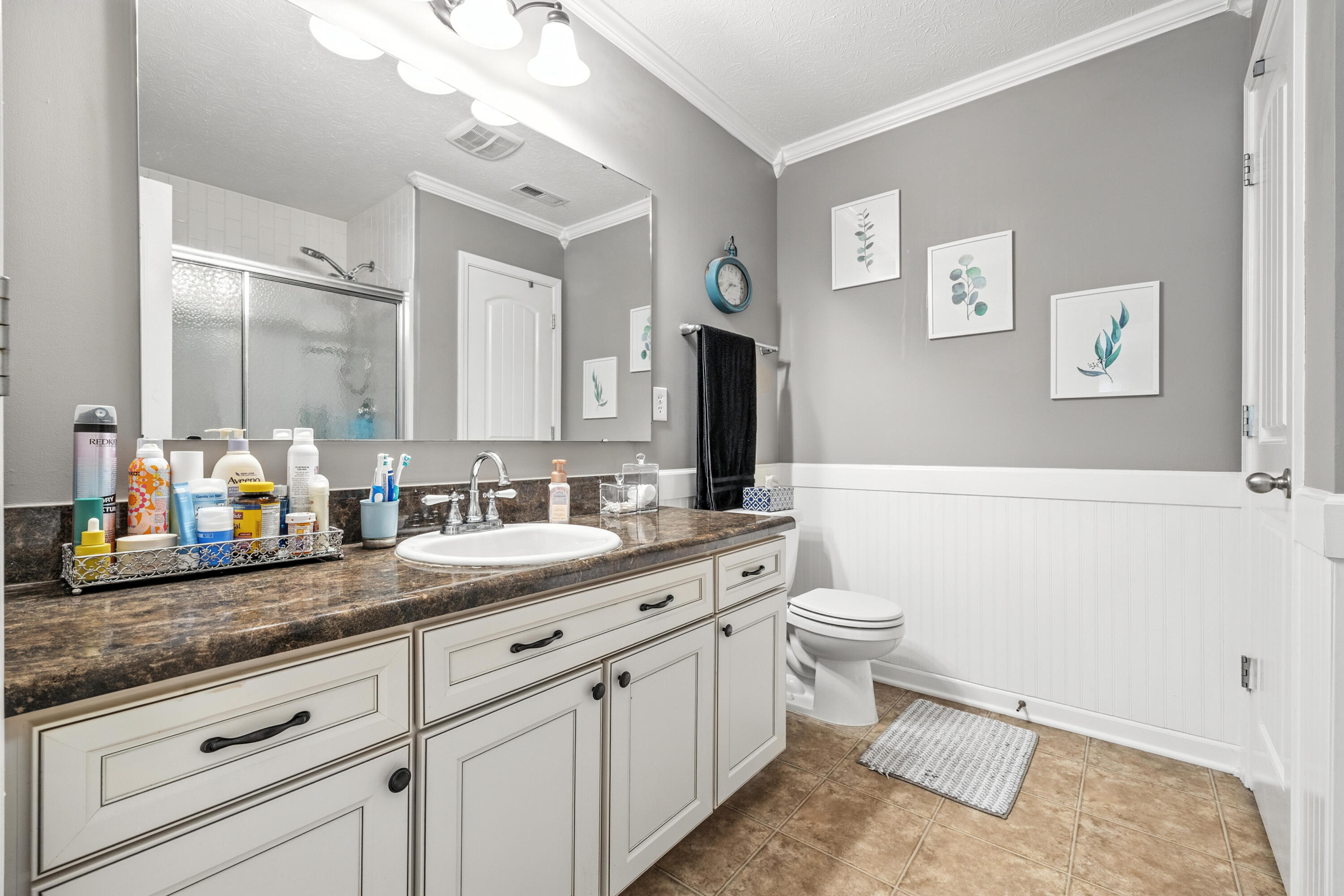5783 Pebblebrooke Road Whitestown, IN 46075 - Photo 19 of 34 a bathroom with a granite countertop sink mirror and toilet