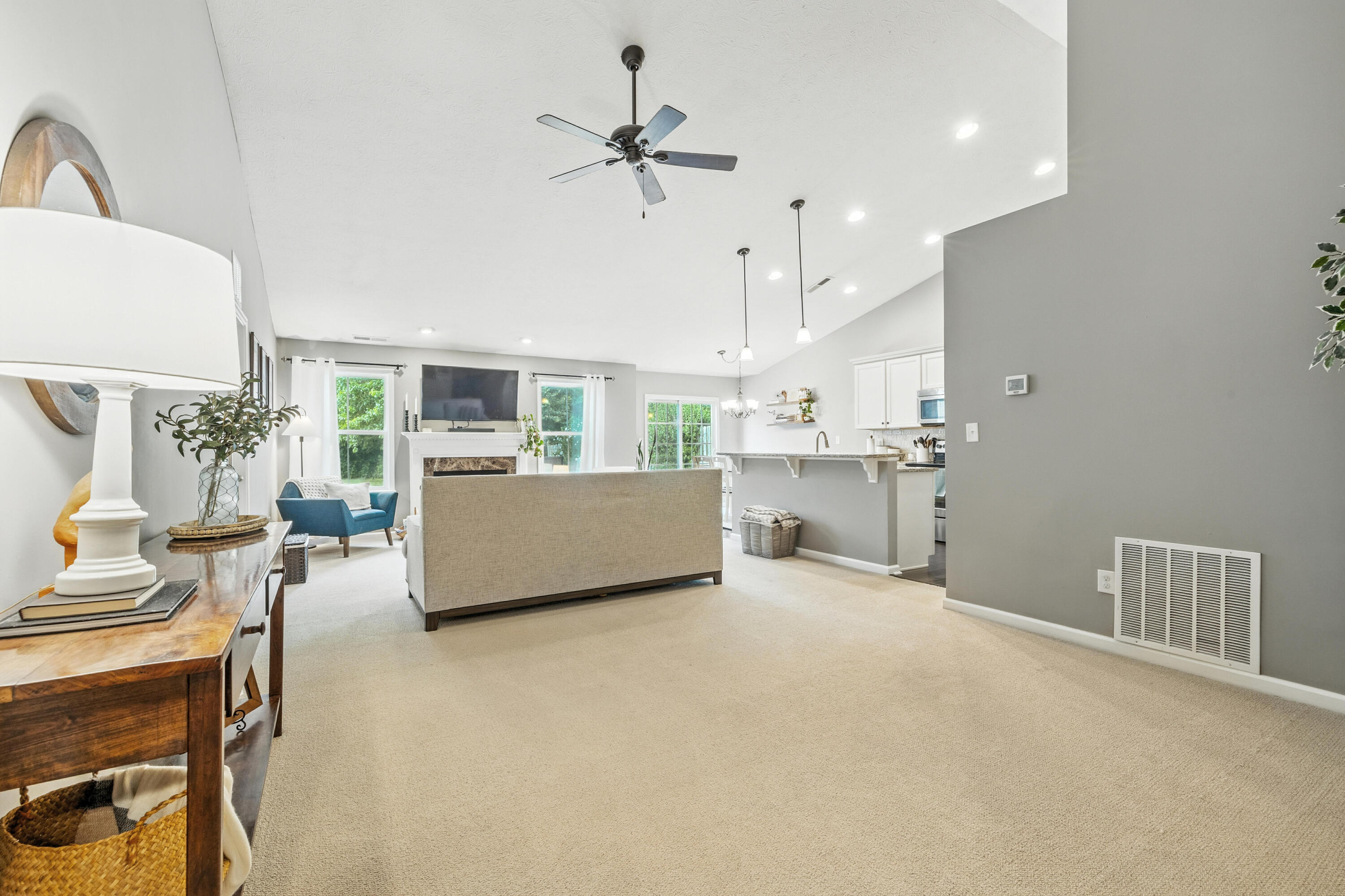 5783 Pebblebrooke Road Whitestown, IN 46075 - Photo 6 of 34 a living room with furniture and a table