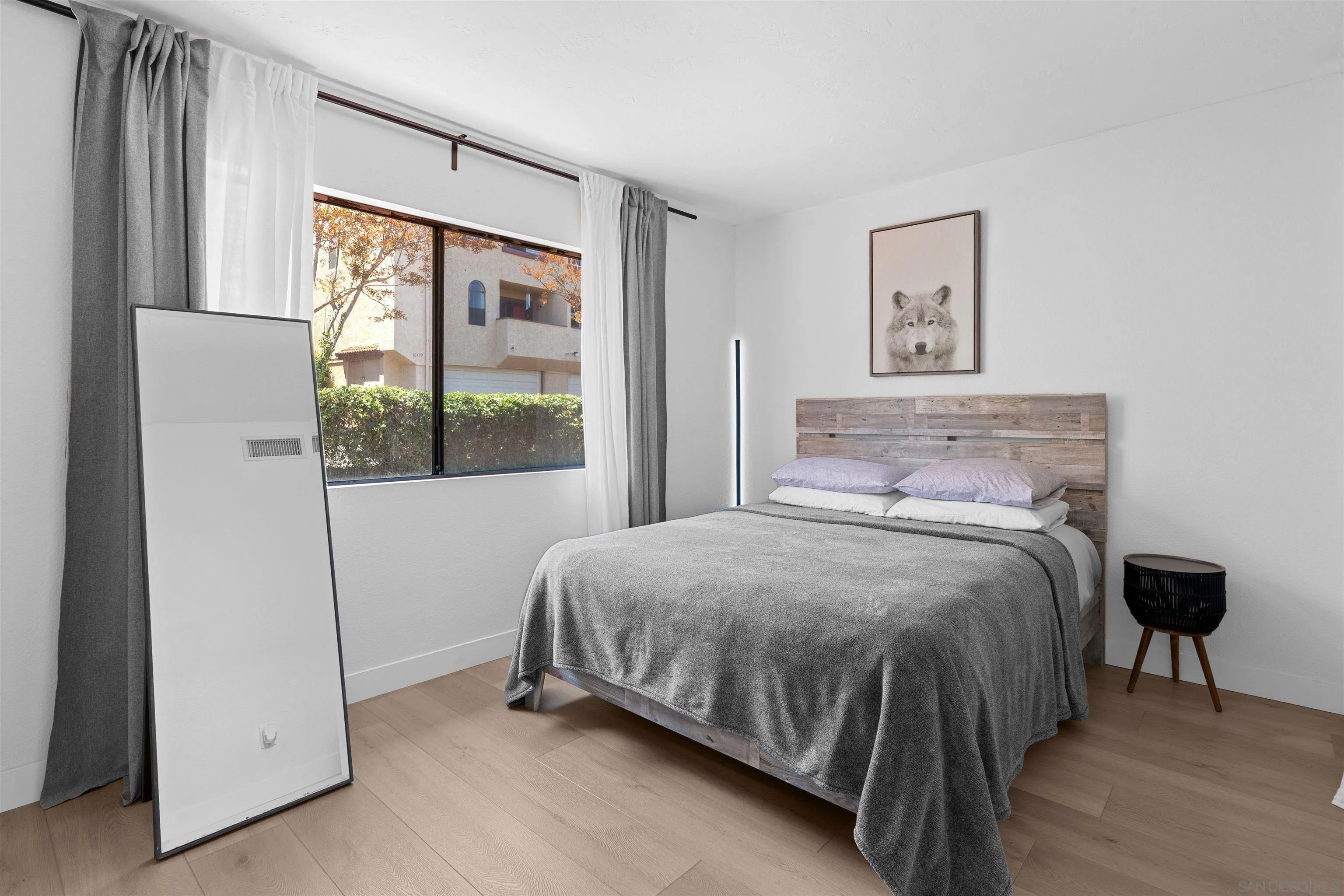 10781 Riderwood Terrace, Unit B Santee, CA 92071 - Photo 25 of 31 a bedroom with a bed and a window