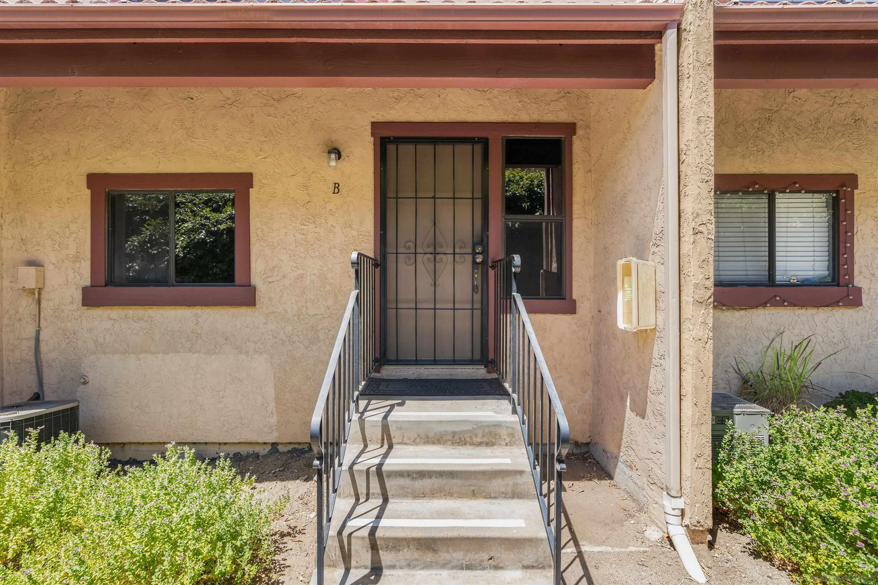 10781 Riderwood Terrace, Unit B Santee, CA 92071 - Photo 3 of 31 a front view of a house with a window