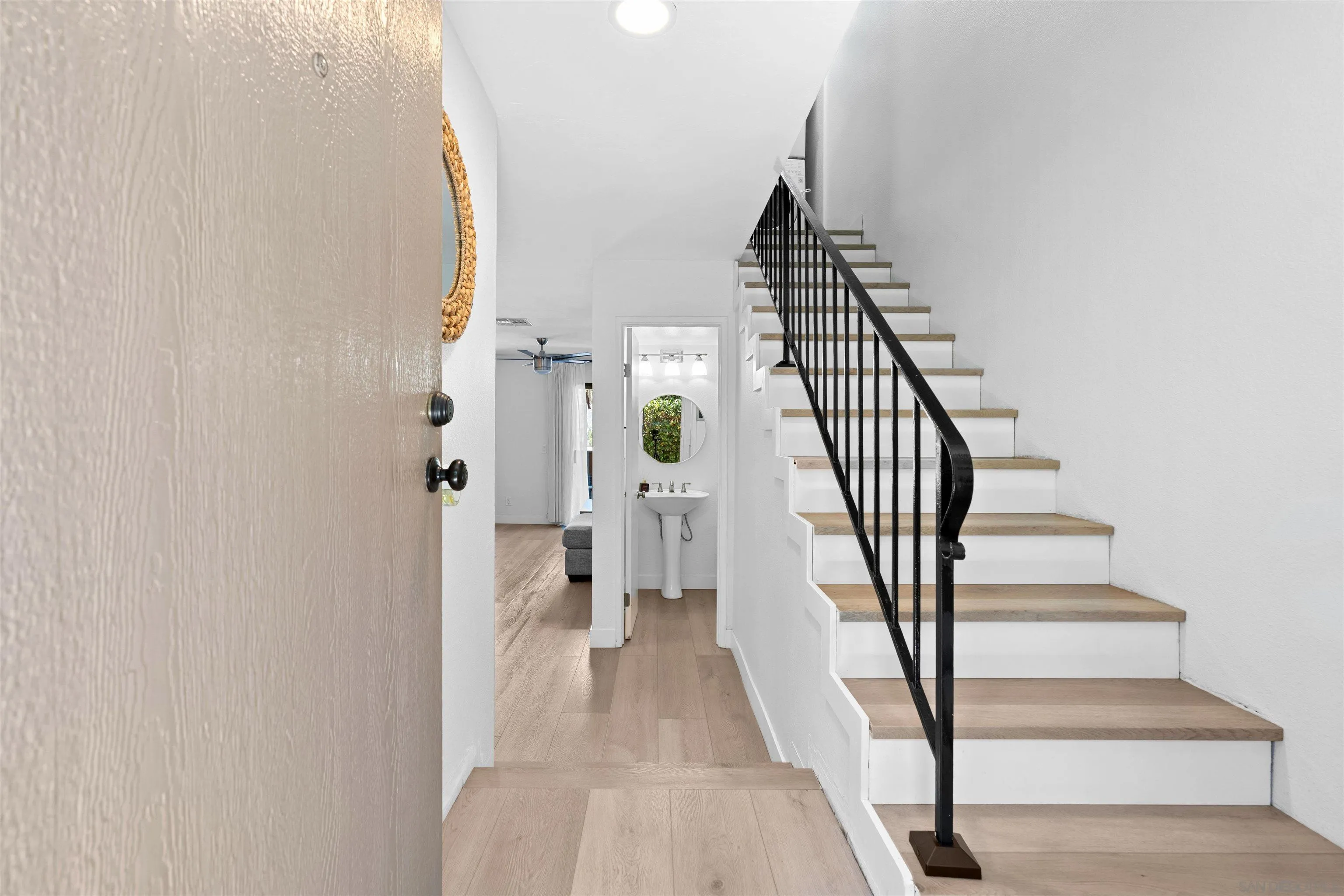 10781 Riderwood Terrace, Unit B Santee, CA 92071 - Photo 5 of 31 a view of entryway and hall with wooden floor