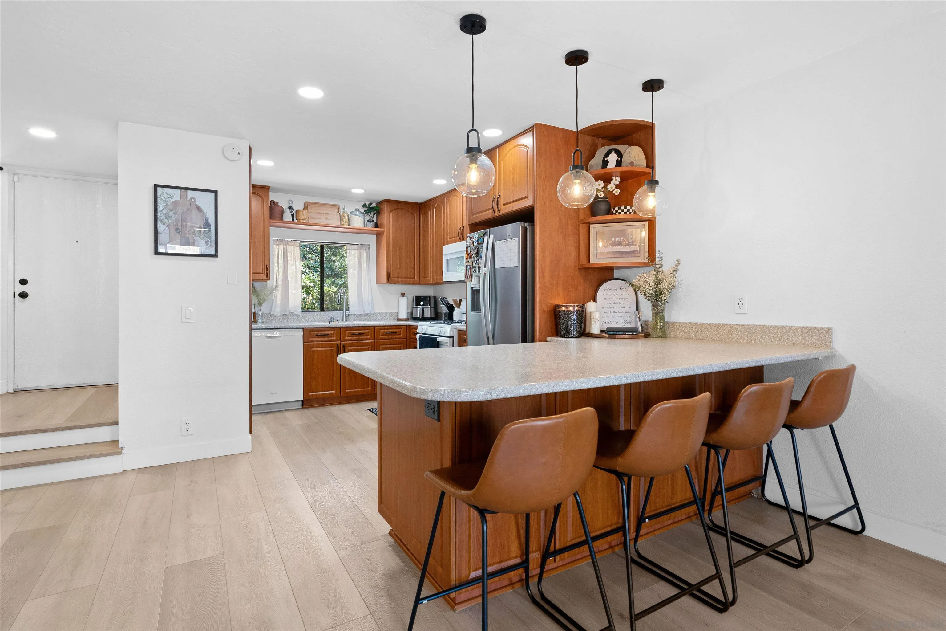 10781 Riderwood Terrace, Unit B Santee, CA 92071 - Photo 6 of 31 a view of a dining room with furniture and wooden floor