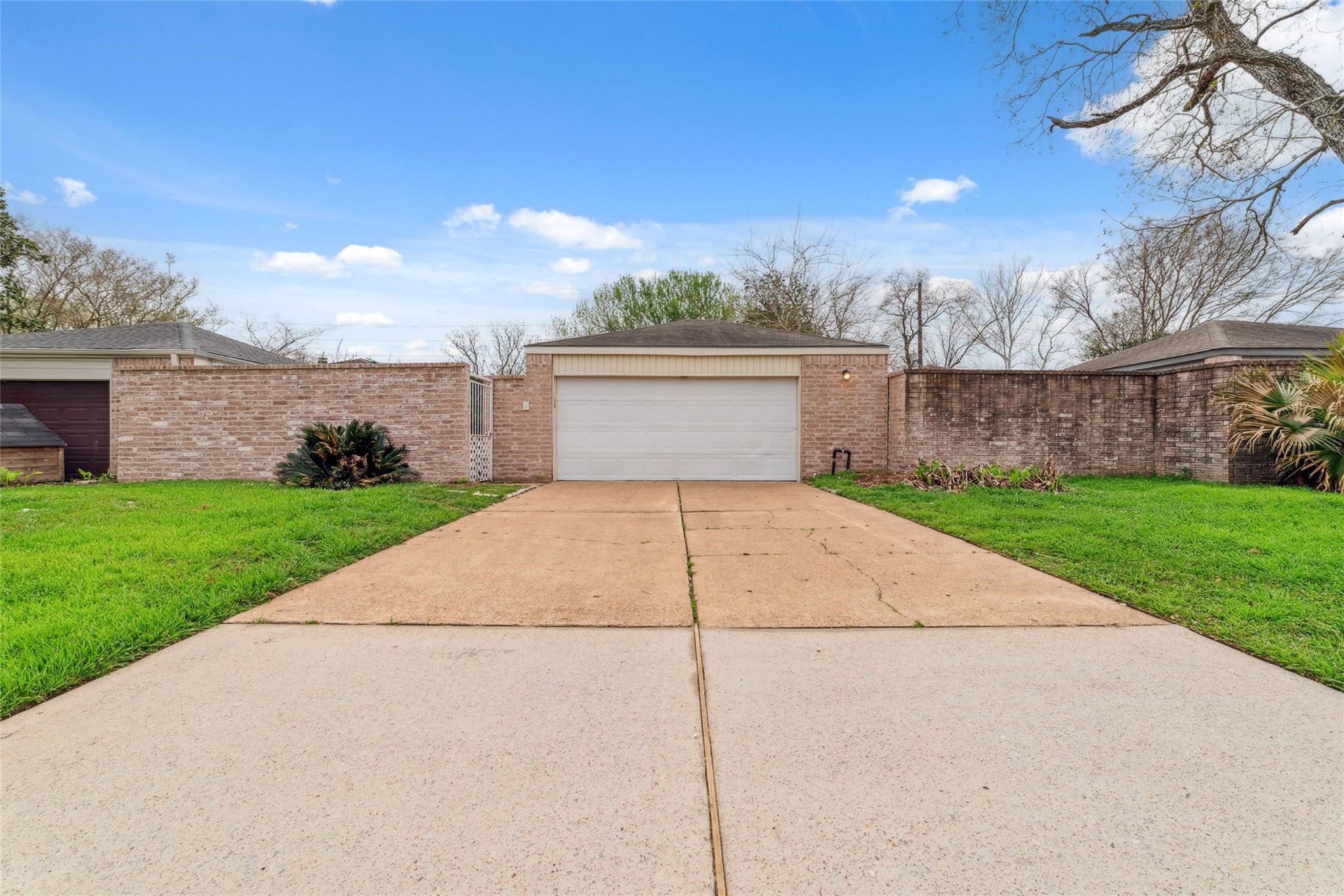 a view of a backyard of the house