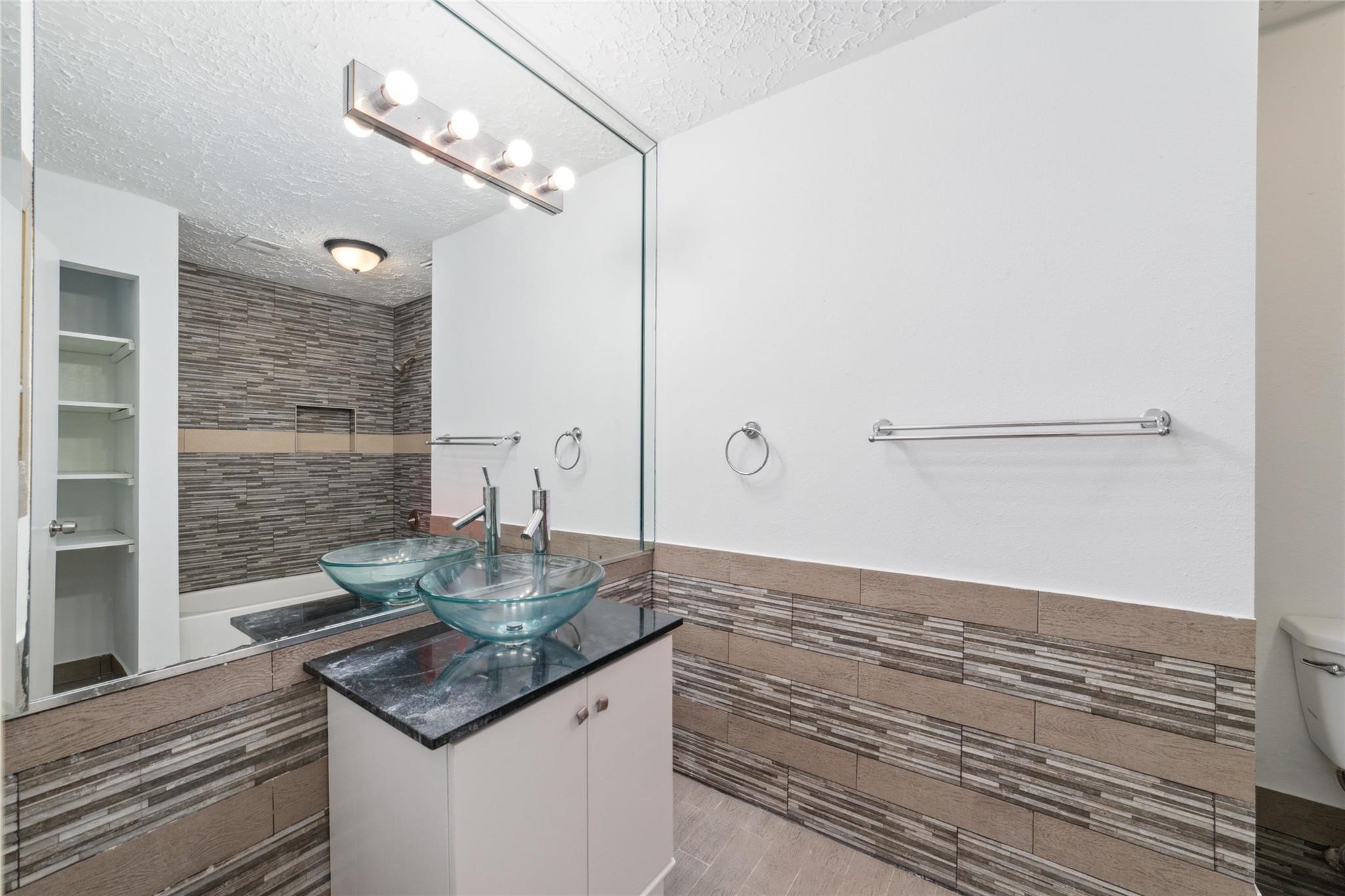 16123 Ridgegreen Drive Houston, TX 77082 - Photo 12 of 21 a kitchen with a sink and cabinets