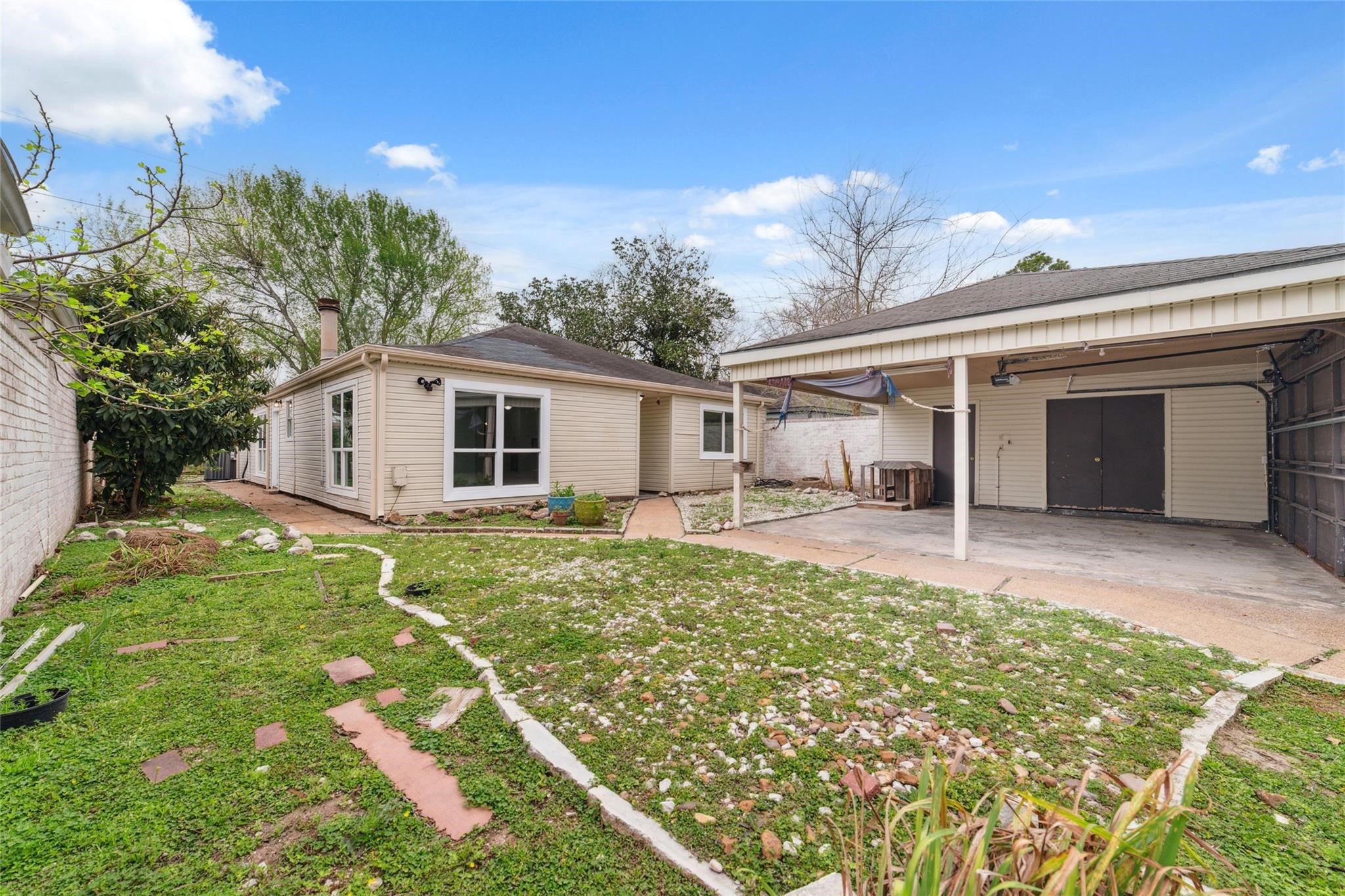 16123 Ridgegreen Drive Houston, TX 77082 - Photo 2 of 21 a view of a house with backyard