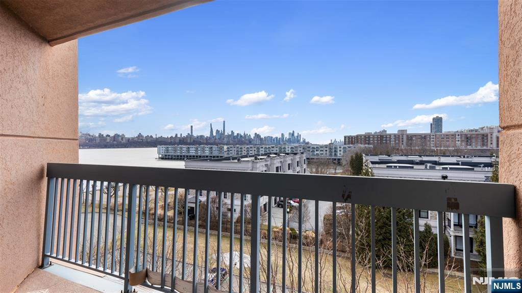 605 Thornton Court, Unit T605 Edgewater, NJ 07020 - Photo 7 of 34 a city view from a balcony
