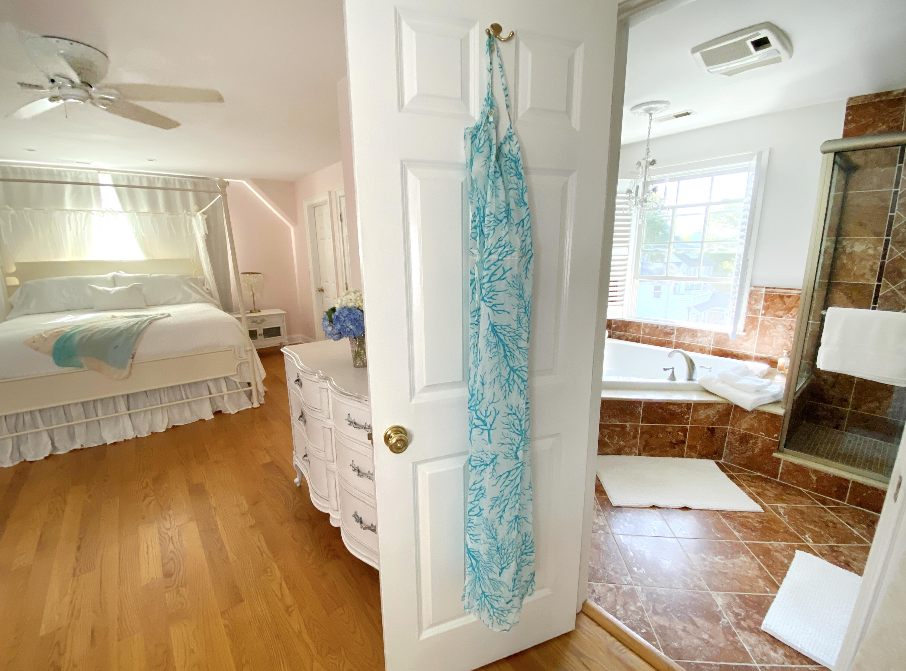 58 Roton Avenue Rowayton, CT 06853 - Photo 21 of 35 a bedroom with furniture and a large window