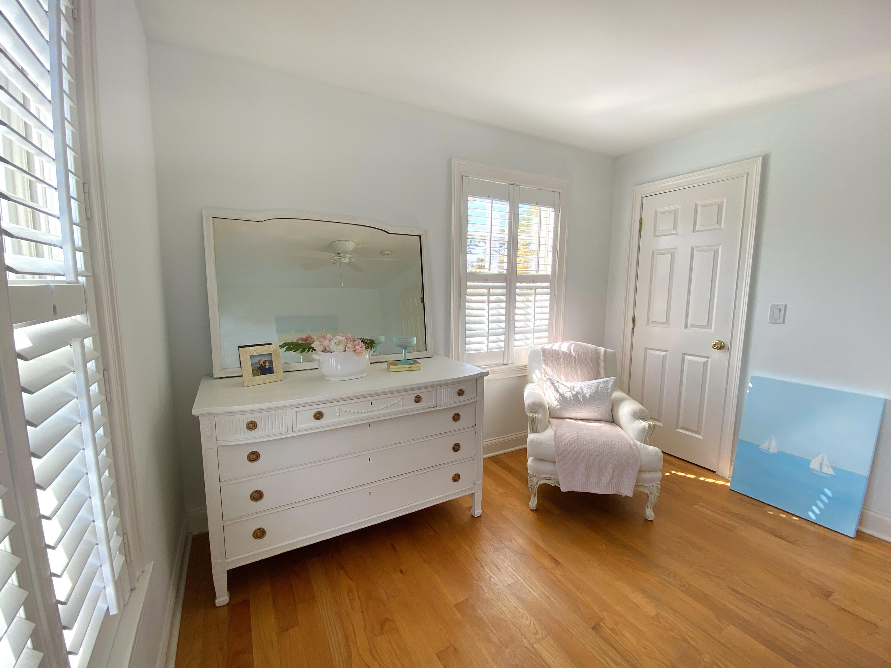 58 Roton Avenue Rowayton, CT 06853 - Photo 26 of 35 a room with a bed and a mirror
