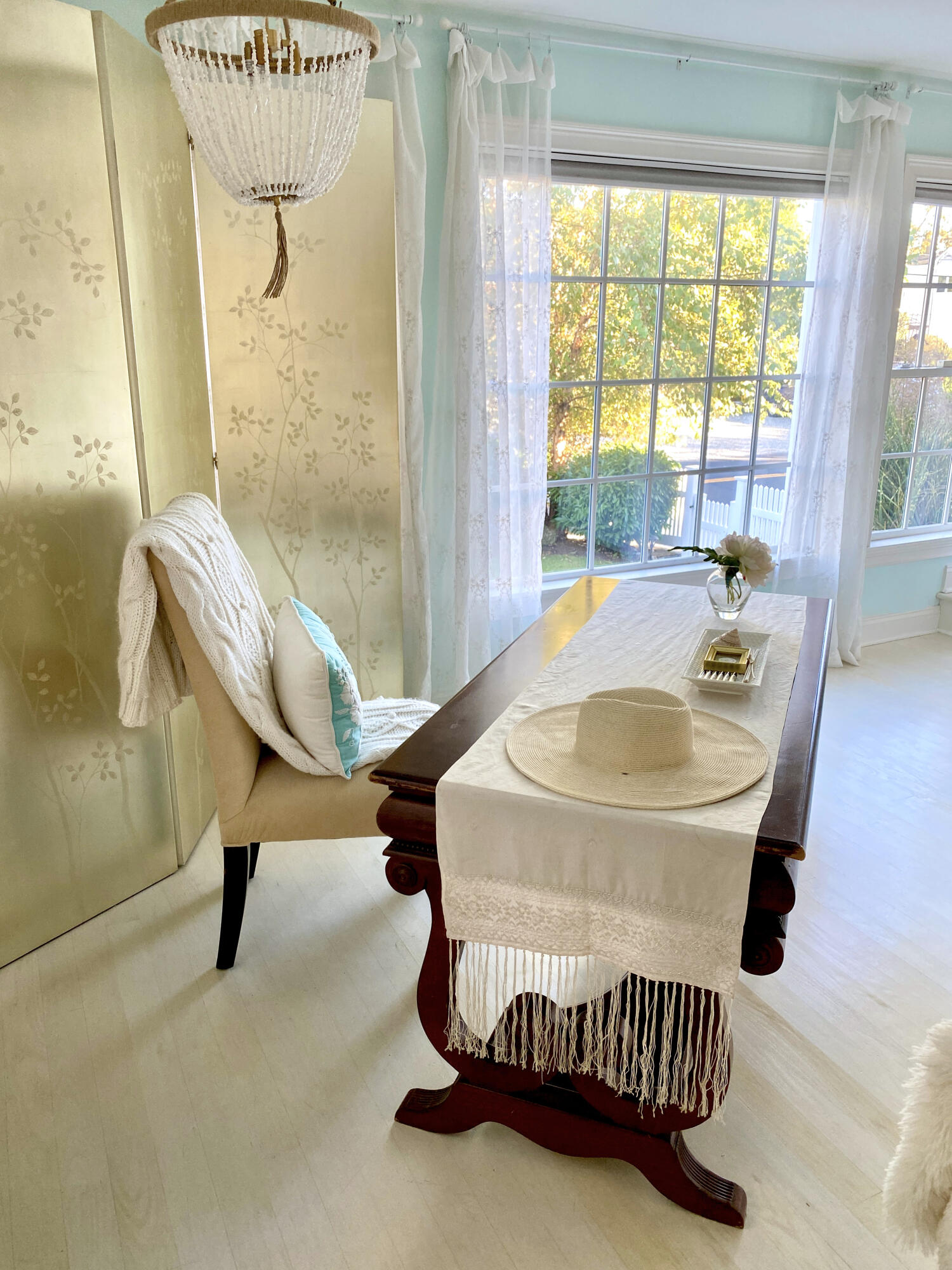 58 Roton Avenue Rowayton, CT 06853 - Photo 8 of 35 a dining room with a table and chairs