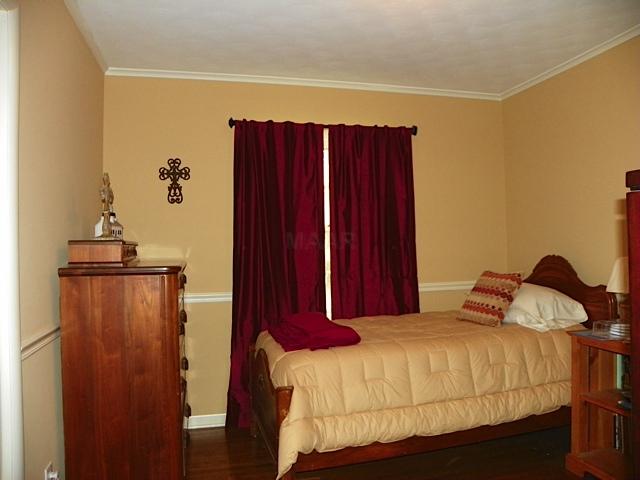 178 North Yates Road Memphis, TN 38120 - Photo 9 of 12 a bedroom with a bed and a closet