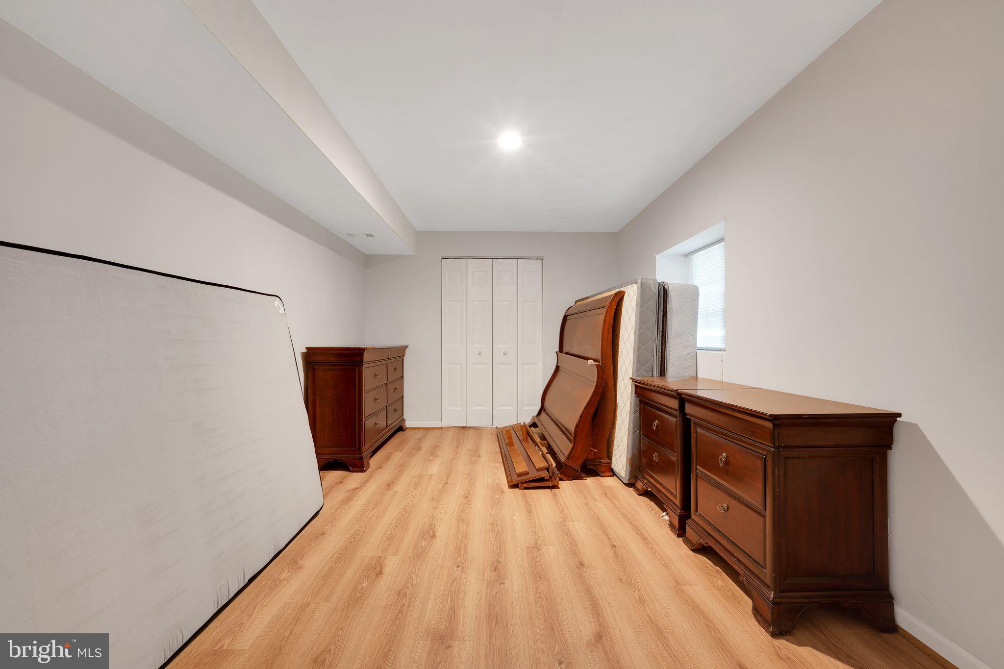 1127 Riva Ridge Drive Great Falls, VA 22066 - Photo 32 of 41 a view of a workspace with furniture and wooden floor