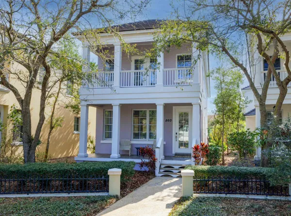 front view of a house with a garden
