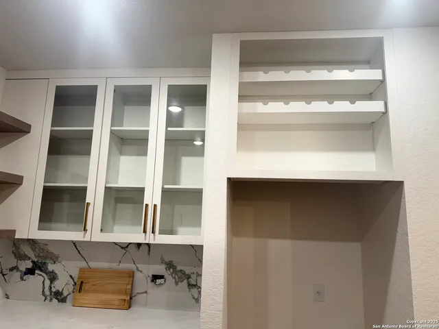 a room with a table and chairs