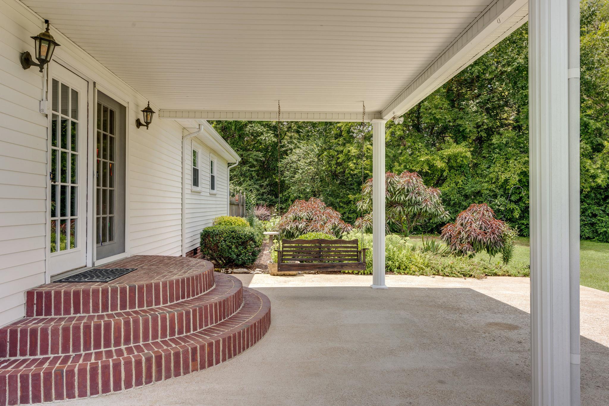 1982 Old Farmington Road Lewisburg, TN 37091 - Photo 27 of 27 Custom brick steps and large covered back patio area