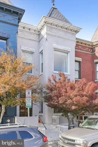 front view of a house with a street
