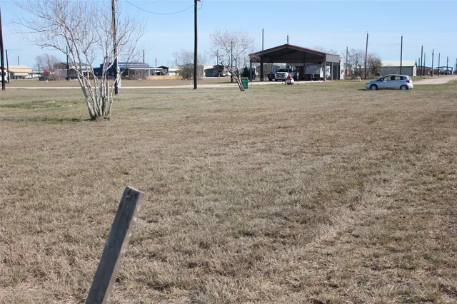 a view of street with houses