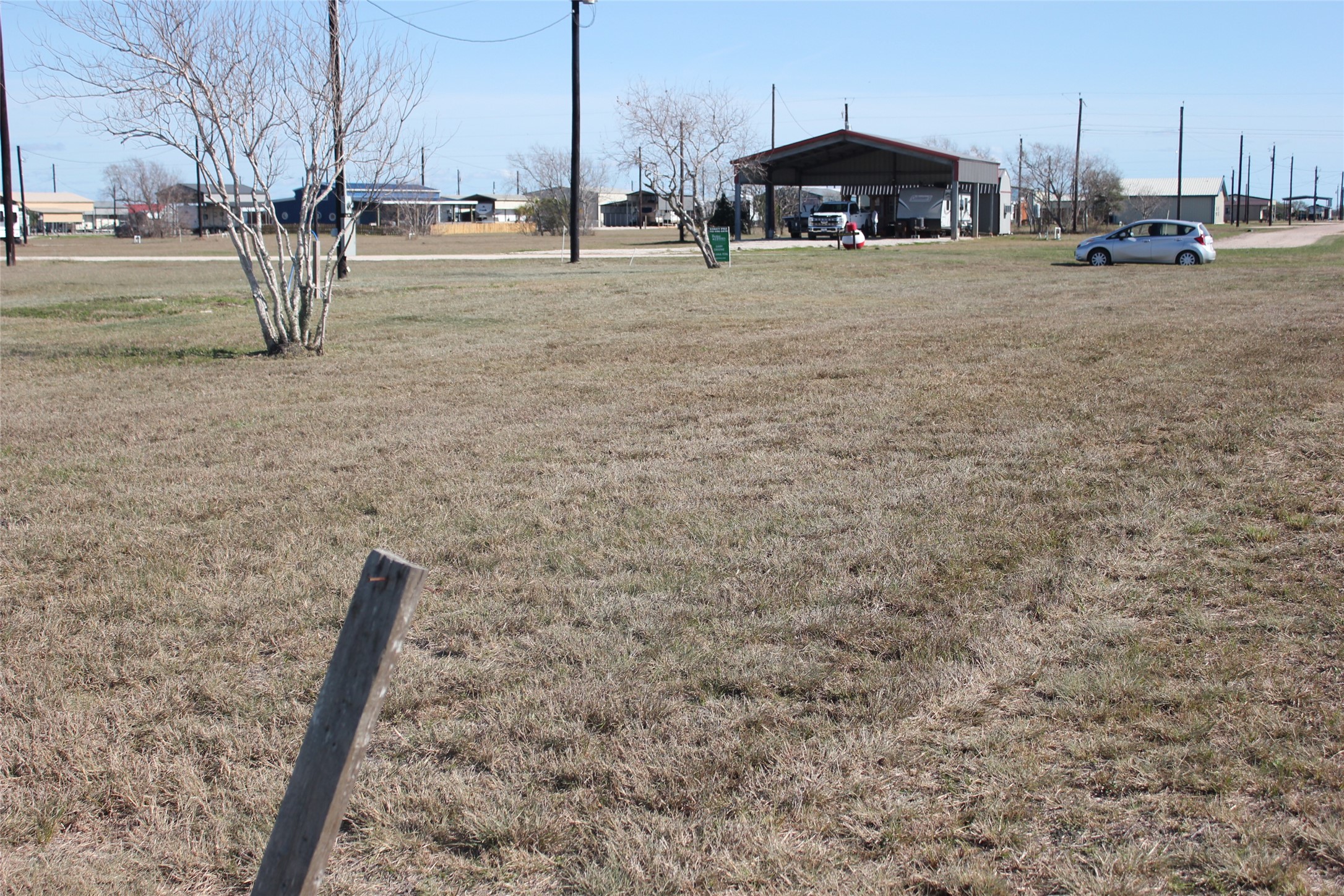 52 Baracuda Drive Palacios, TX 77465 - Photo 3 of 14 a view of street with houses