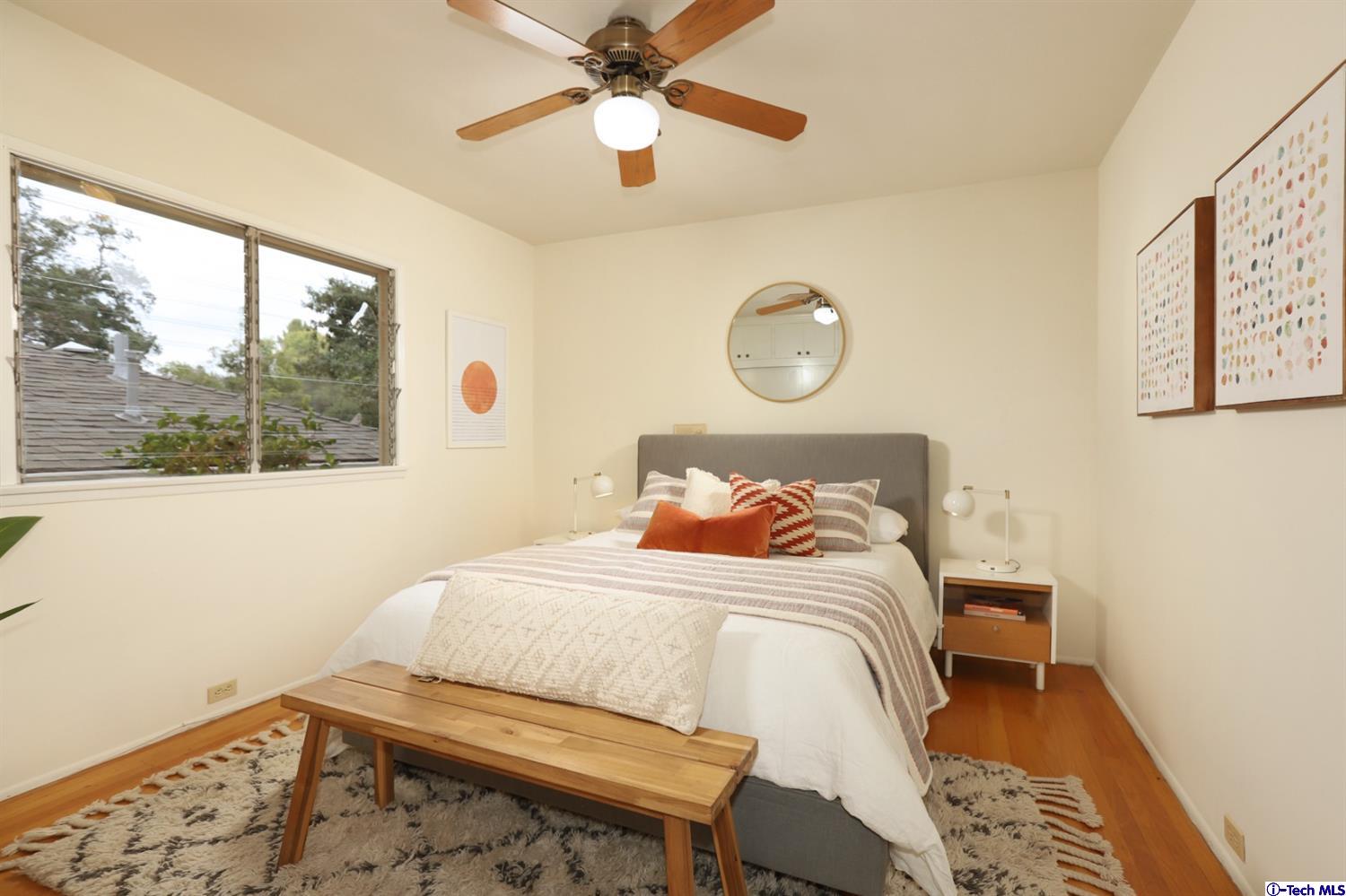 1350 Selvas Place Glendale, CA 91208 - Photo 13 of 30 a bedroom with a bed and a window