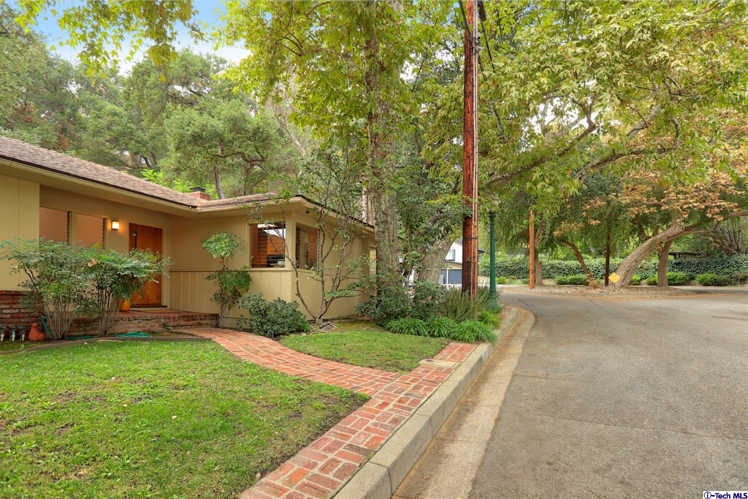 1350 Selvas Place Glendale, CA 91208 - Photo 29 of 30 a view of a house with a yard