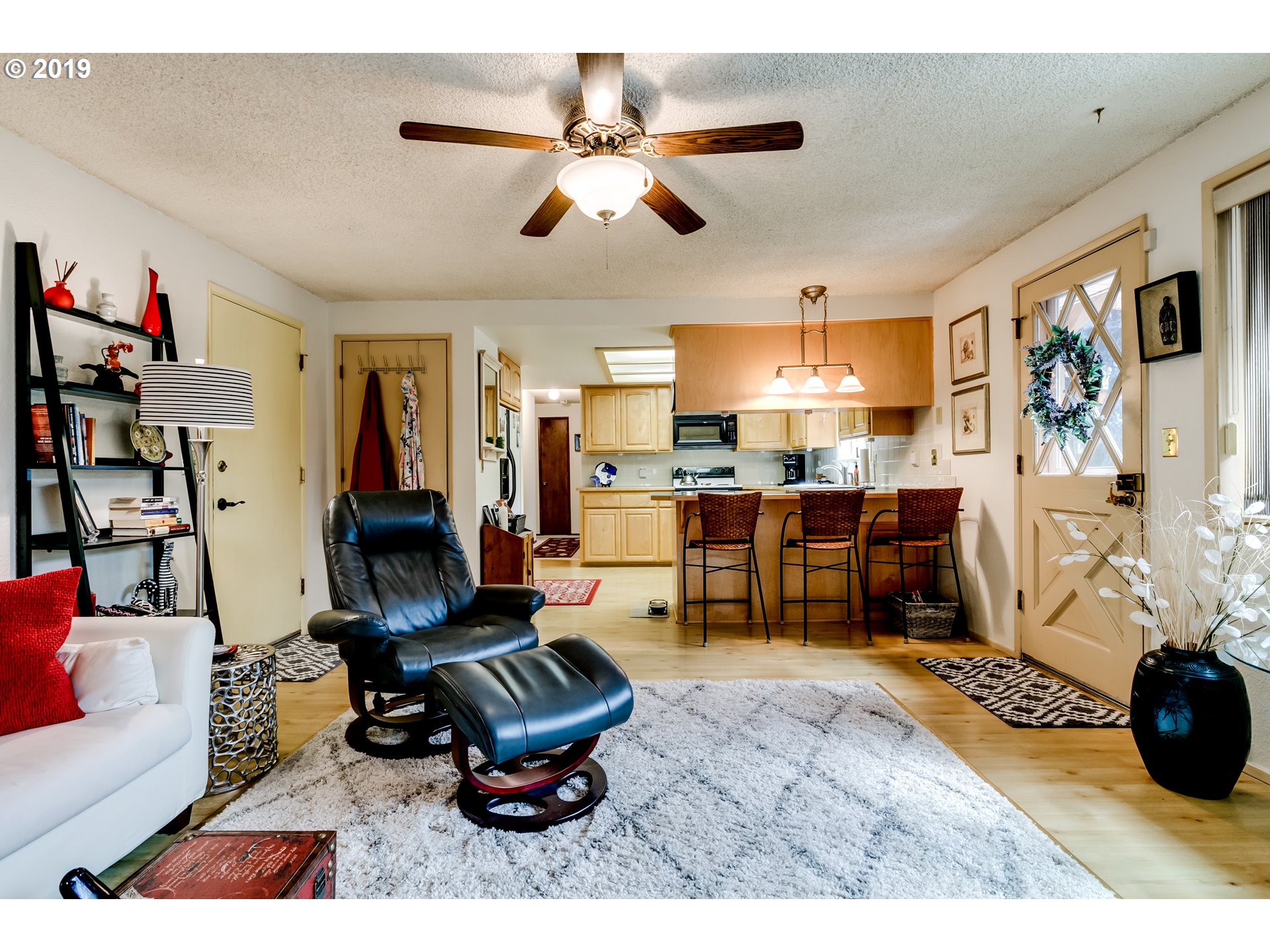 537 66th Street Springfield, OR 97478 - Photo 23 of 32 a living room with furniture and a flat screen tv
