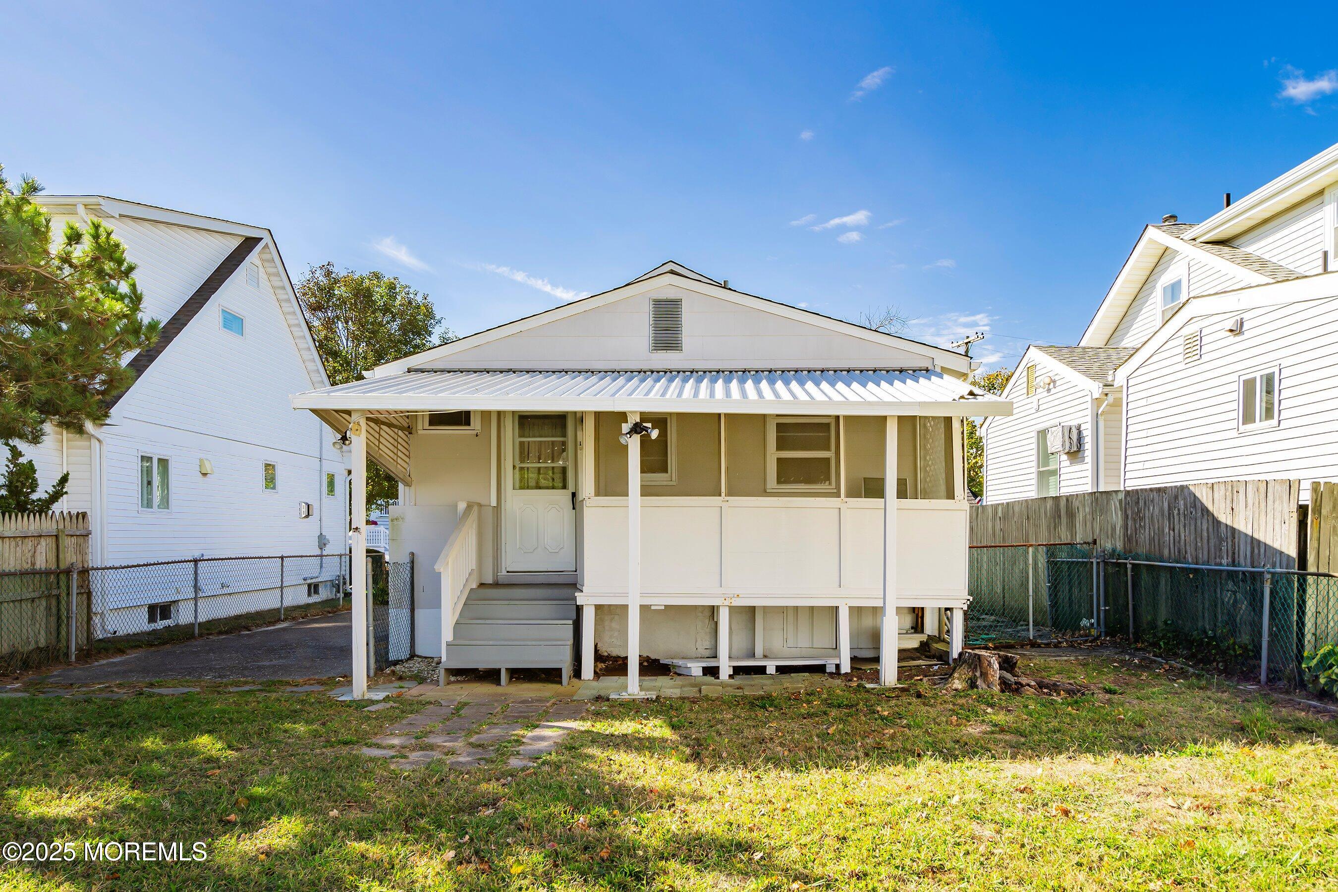 204 19th Avenue Belmar, NJ 07719 - Photo 16 of 24 a view of a house with a yard