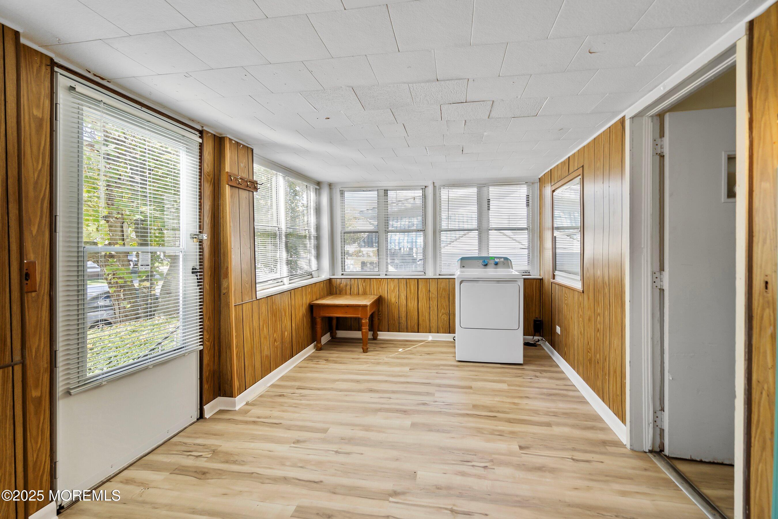 204 19th Avenue Belmar, NJ 07719 - Photo 5 of 24 a spacious bedroom with a large bed and large windows