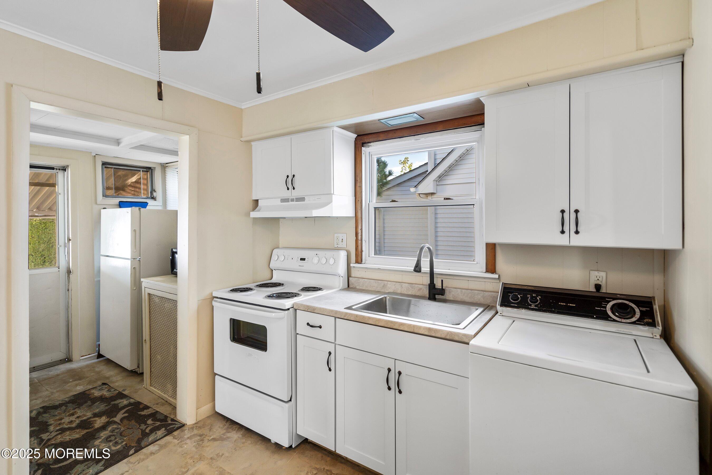 204 19th Avenue Belmar, NJ 07719 - Photo 10 of 24 a room with storage and utility