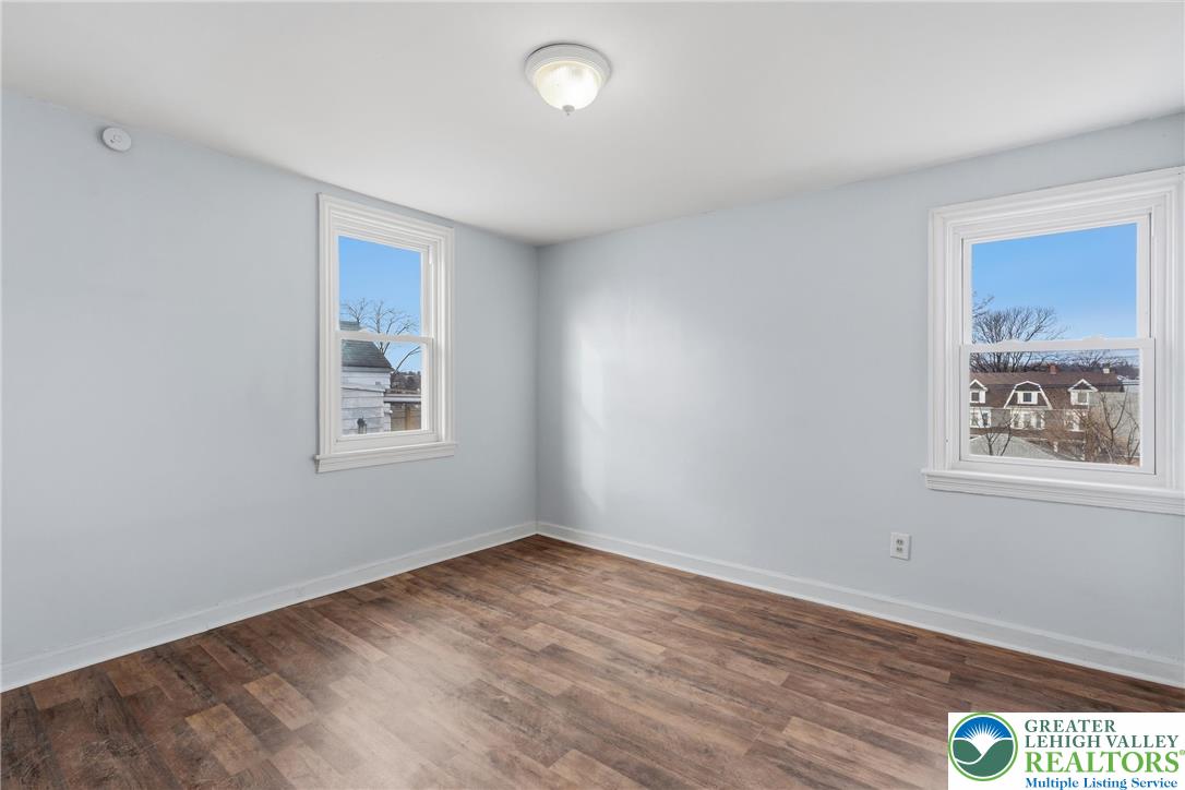46 West Garrison Street Bethlehem, PA 18018 - Photo 15 of 39 wooden floor in an empty room with a window