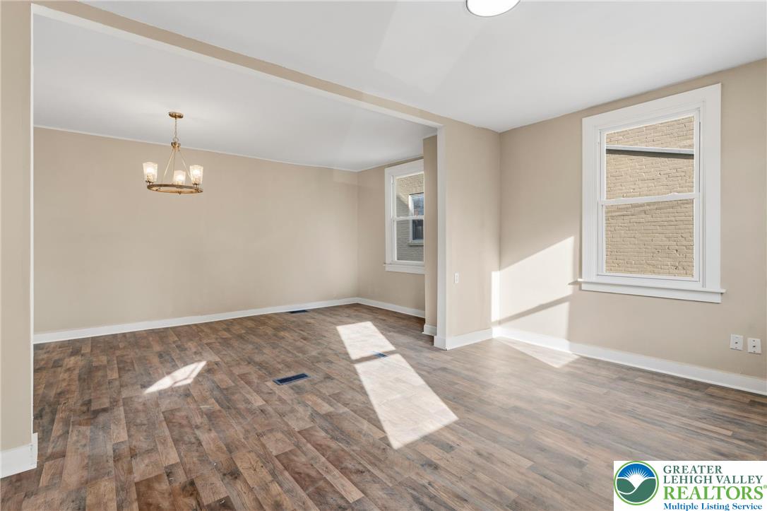 46 West Garrison Street Bethlehem, PA 18018 - Photo 5 of 39 a view of an empty room with wooden floor and a window