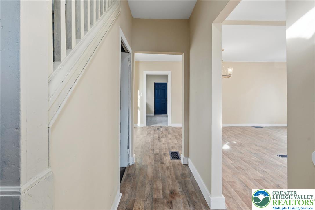 46 West Garrison Street Bethlehem, PA 18018 - Photo 6 of 39 a view of a hallway with wooden floor and staircase