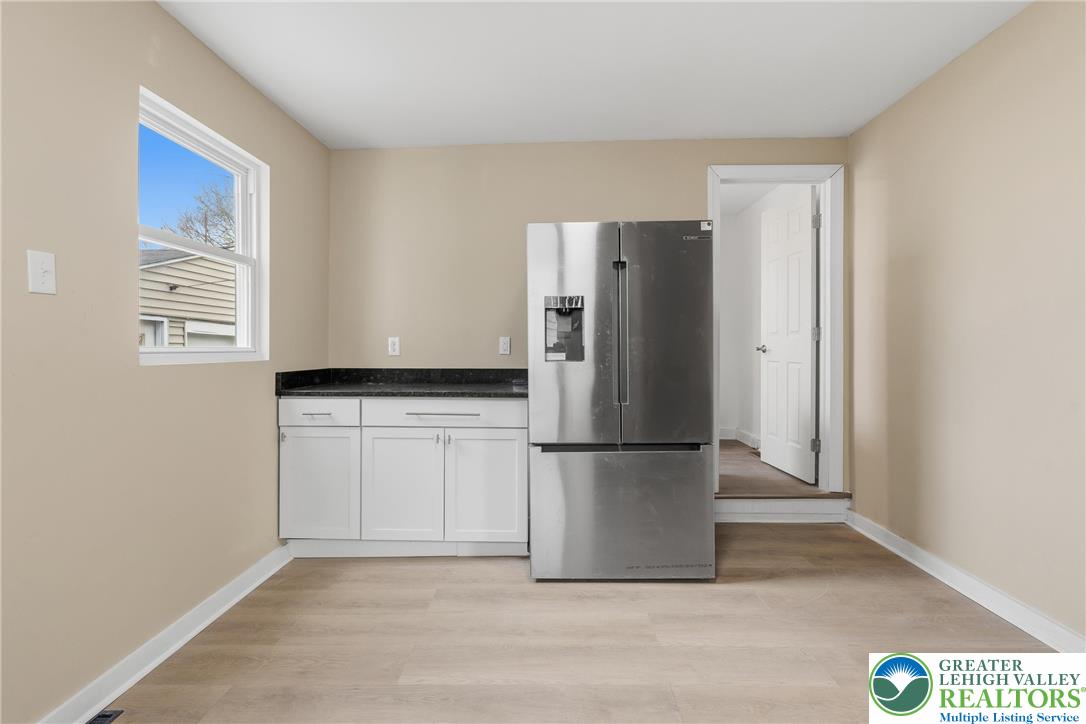 46 West Garrison Street Bethlehem, PA 18018 - Photo 8 of 39 a kitchen with refrigerator and window