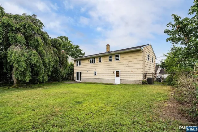 an aerial view of a city with lots of residential buildings