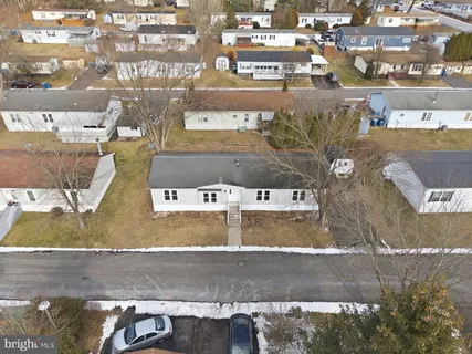 a view of a house with a street