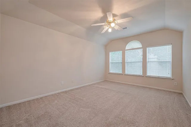 a bathroom with a bathtub a sink and a mirror