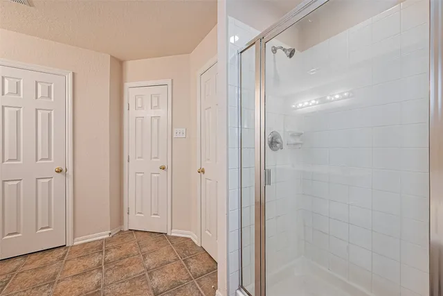 a bathroom with a bathtub and a sink