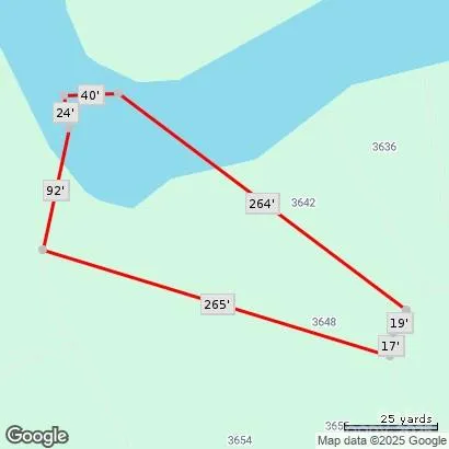 a swimming pool with outdoor seating and garden